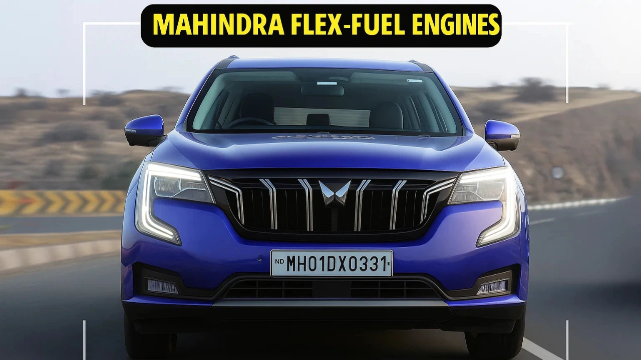 A close-up front view of a blue Mahindra SUV with the text "Mahindra Flex-Fuel Engines" overlaid at the top.