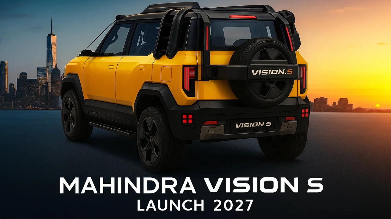 Rear view of the yellow Mahindra Vision S concept SUV. "VISION.S" branding and "MAHINDRA VISION S LAUNCH 2027" text visible.