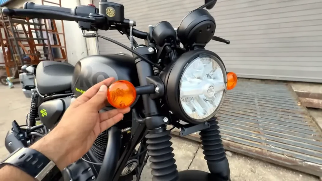 Royal Enfield Hunter 350 Graphite Grey with neon yellow accents parked on Indian city street