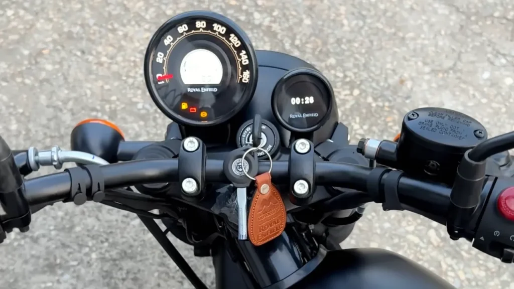 Royal Enfield Hunter 350 Graphite Grey with neon yellow accents parked on Indian city street