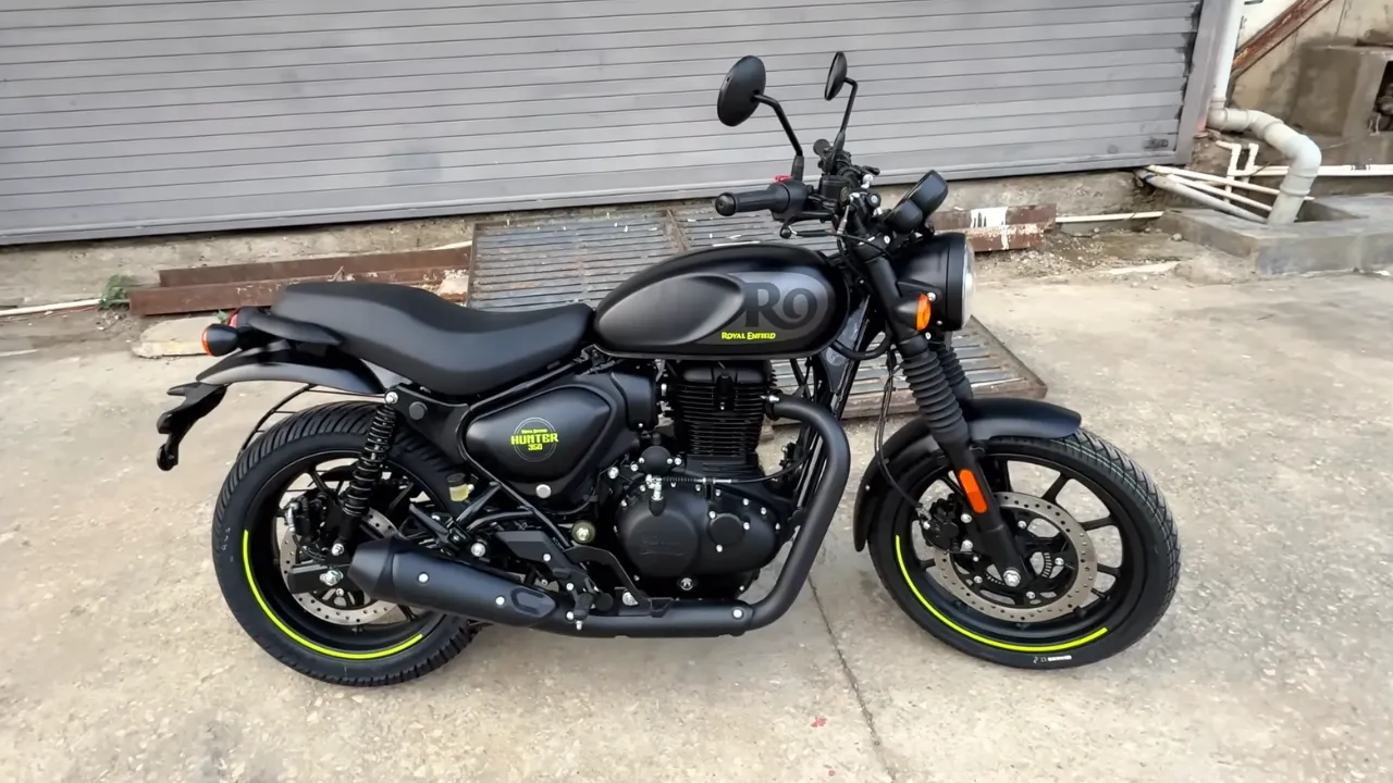 Royal Enfield Hunter 350 Graphite Grey with neon yellow accents parked on Indian city street