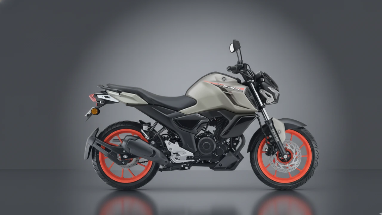 Side profile of the new Yamaha FZ Rave motorcycle in a beige/grey color with striking orange alloy wheels, highlighting its design and relevance to the Yamaha FZ Rave price and launch."